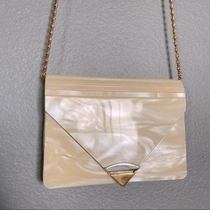 Cream with mother of pearl finish mini purse